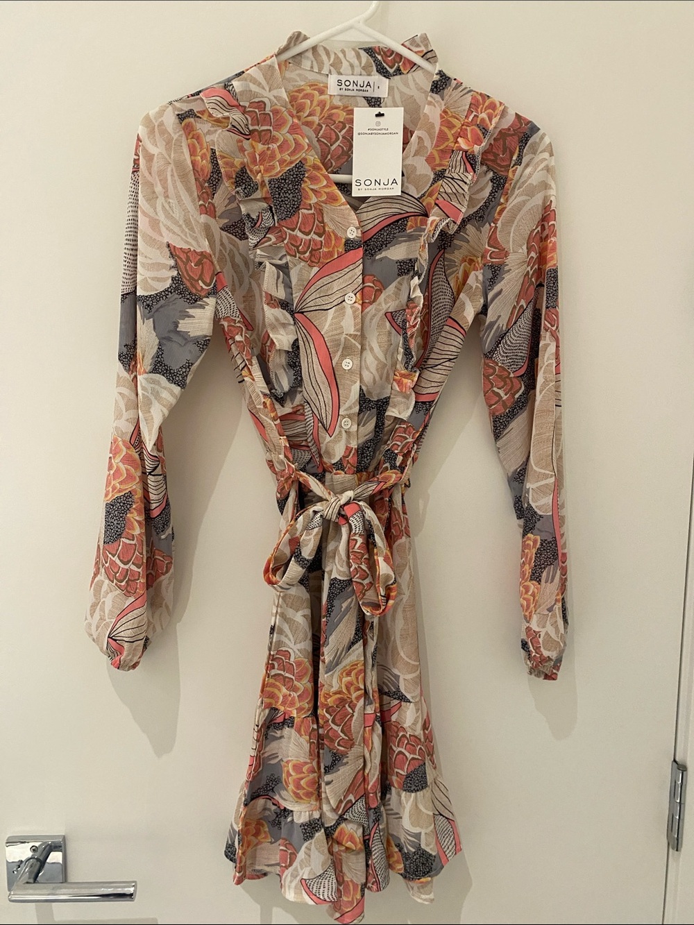 NWT Sonja By Sonja Morgan V-Neck Ruffle Trim 
Floral/Abstract Print Mini Dress S